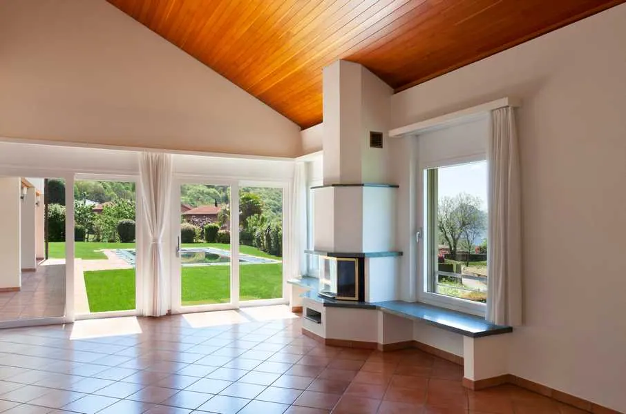 Finished living space with warm flooring and natural light