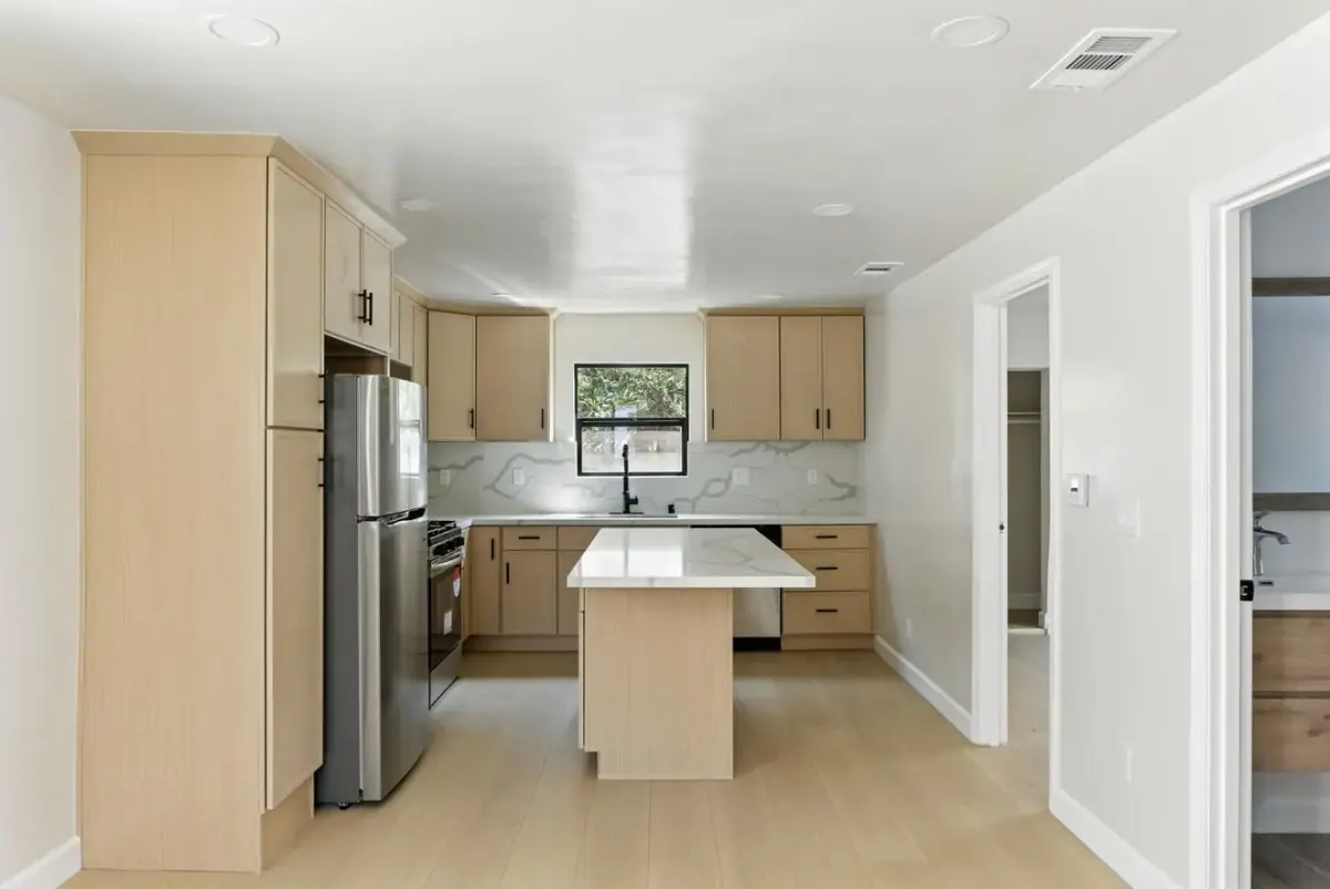 Bright kitchen with new cabinetry and island